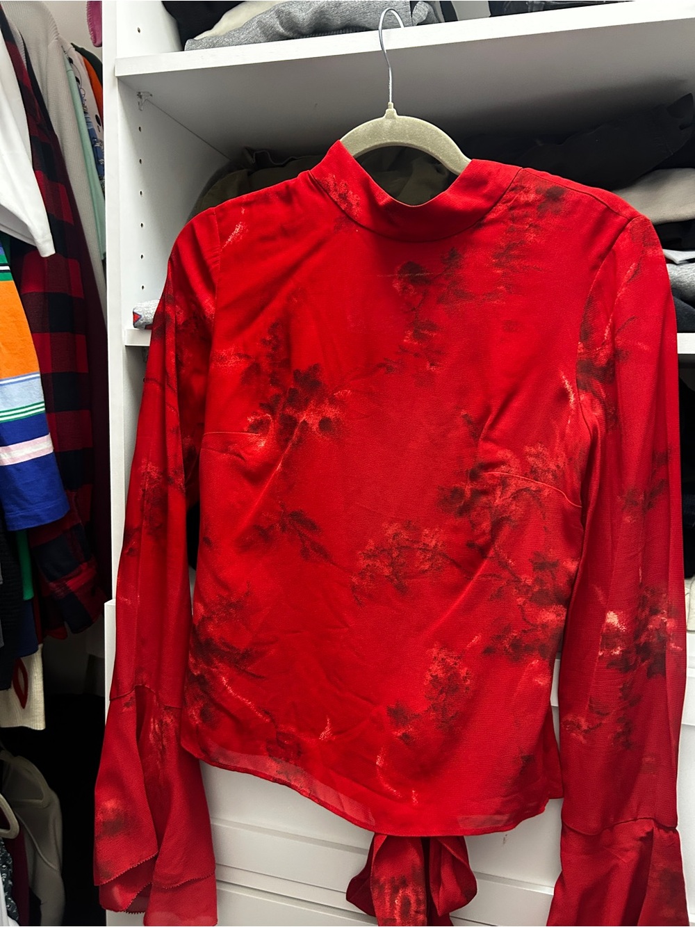 Roxana top in a vermillion red floral print, featuring a mock neck & flutter sle - Picture 7 of 13
